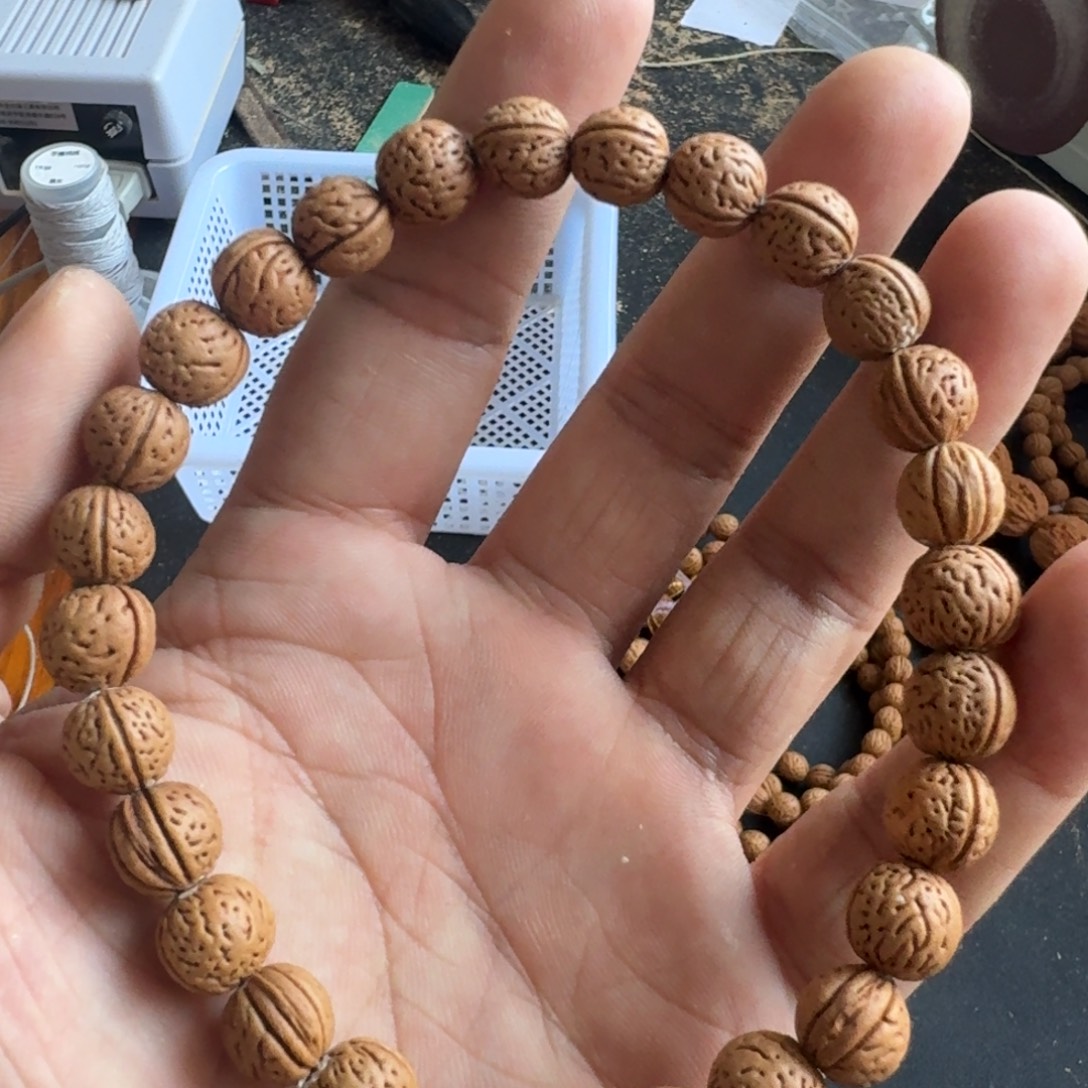 漆***锦小桃核小桃核手串