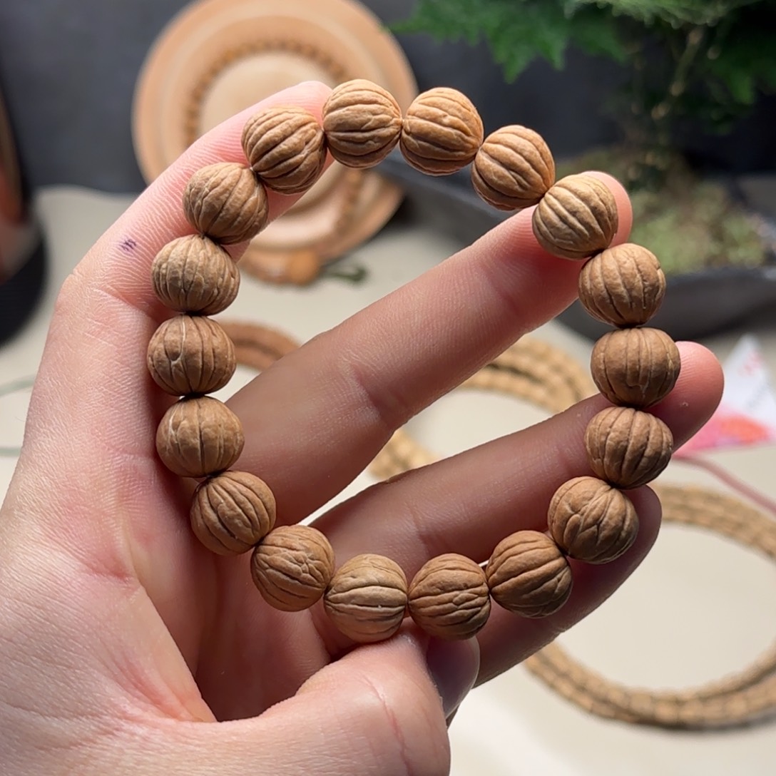 橄榄核吊坠猴头手串