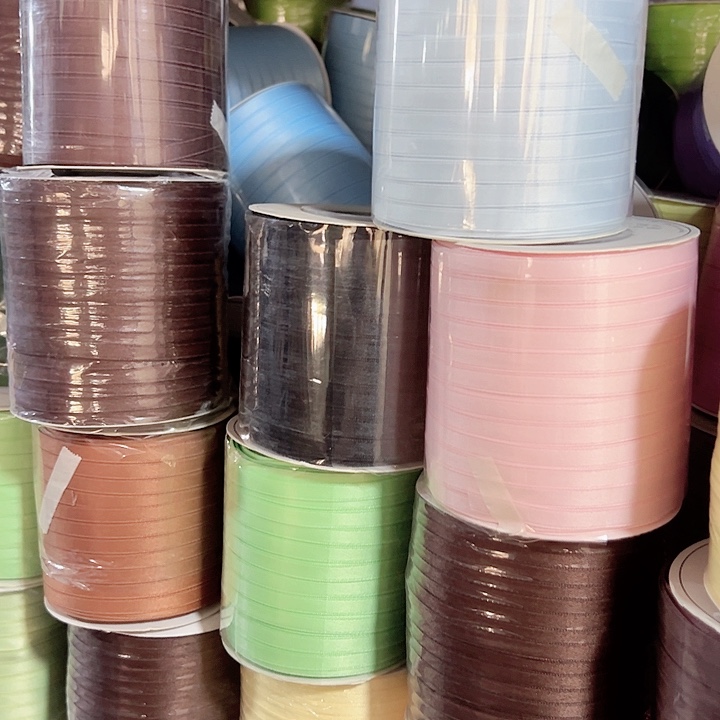 0.6的亮光棉带浅浅蓝浅韩粉黑色各50码