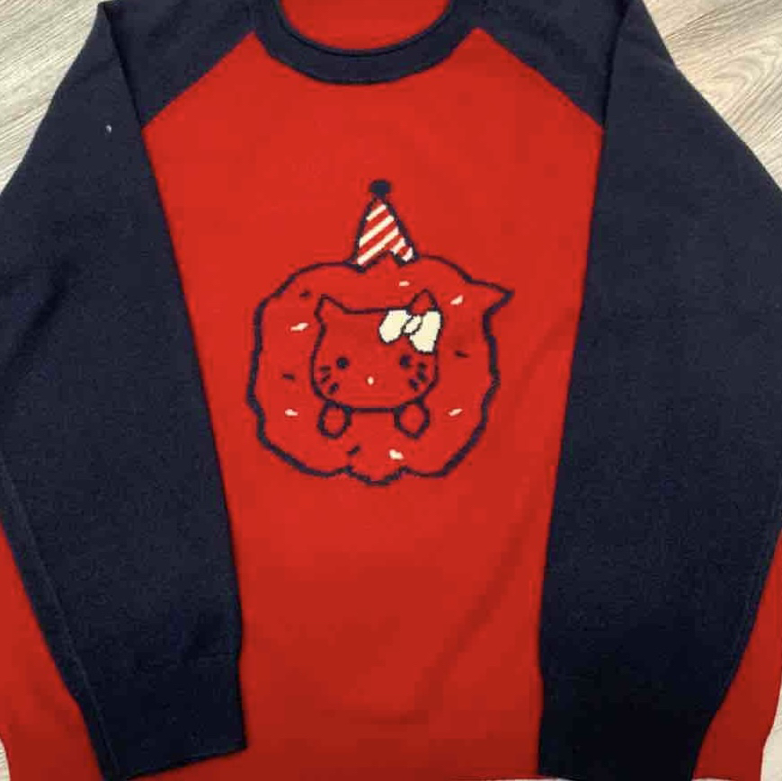 韩小姐韩国东大门KT猫叉肩毛衫09050