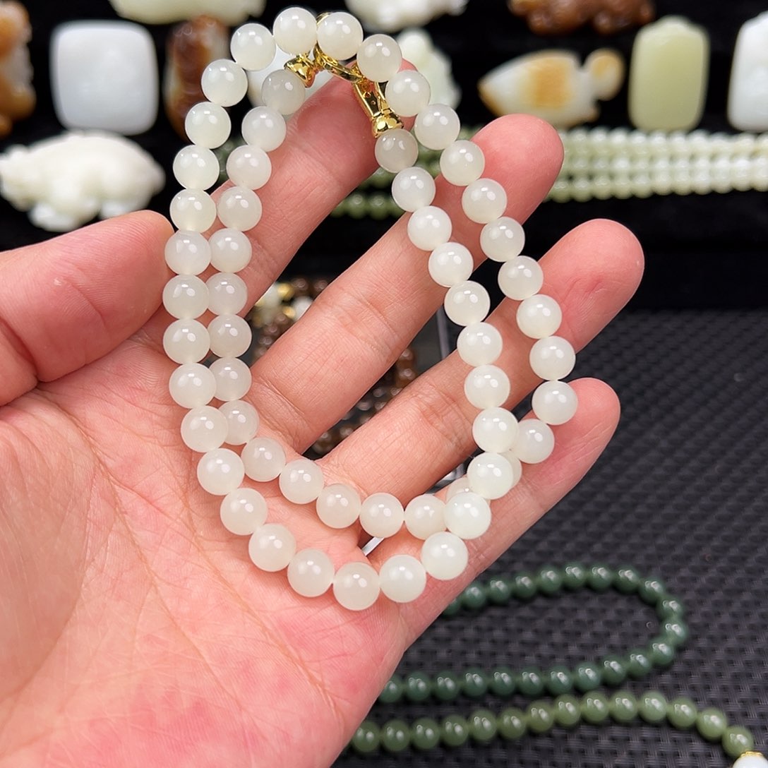 和田玉颈饰未镶嵌蛋**怂