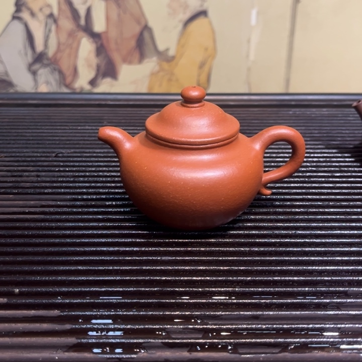 紫砂茶壶莲子红降坡