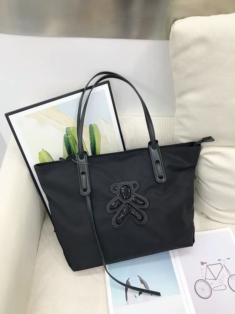 大容量通勤托特包2025新款黑色饺子包卡通亮片小熊休闲单肩包3165