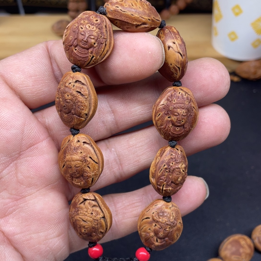 桃核雕刻观音手串