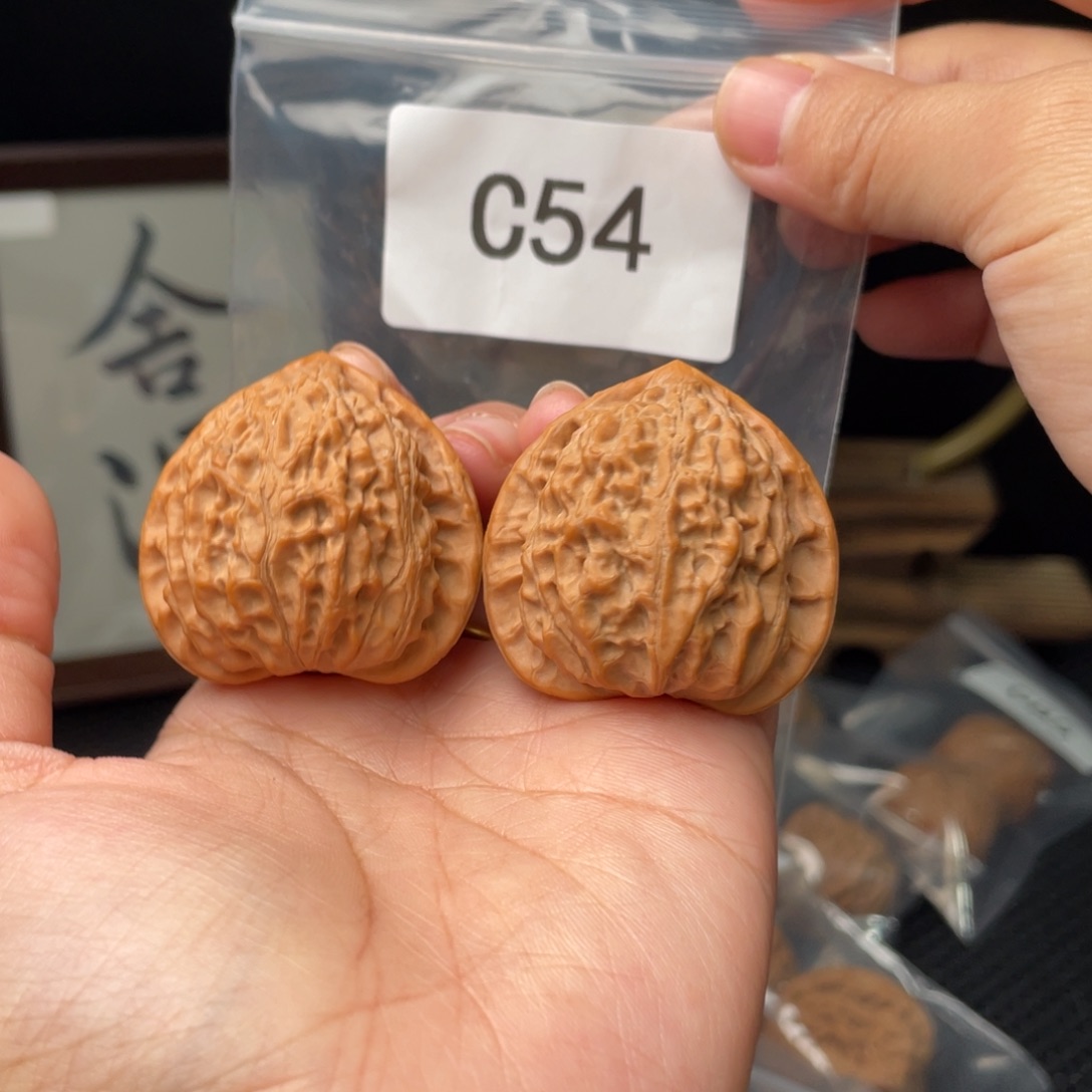 文玩核桃把件40金牛