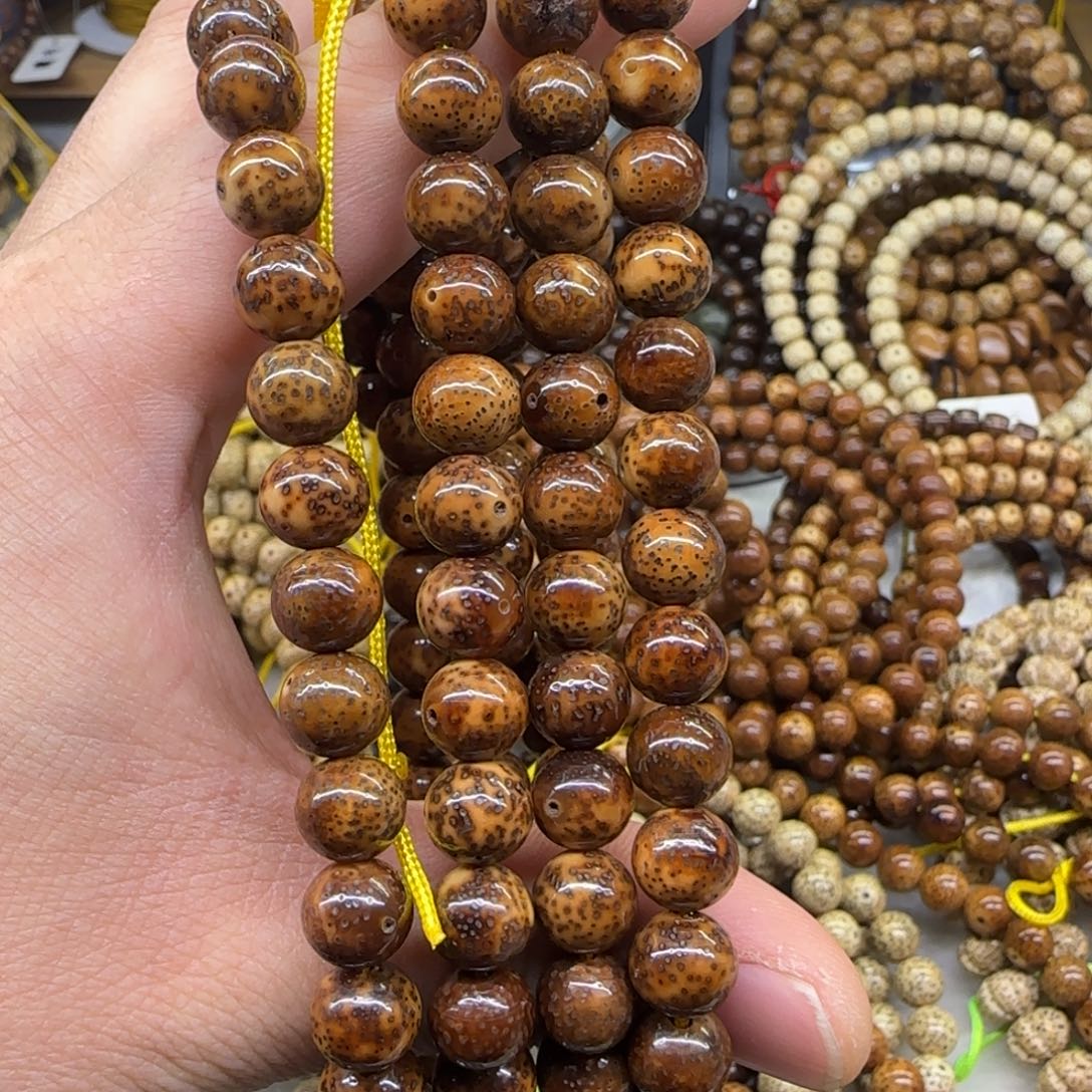 钦****吊坠星月菩提10陈籽虎皮玉化圆脖挂