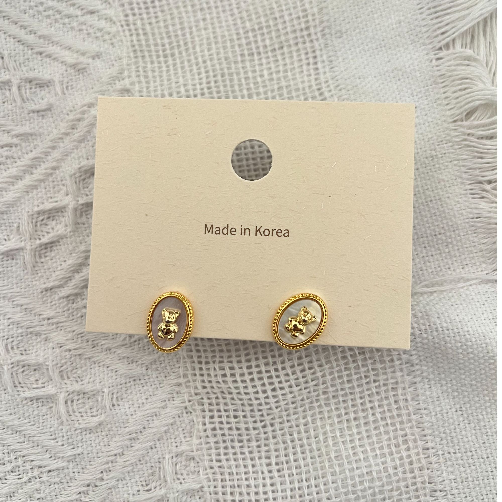 铜合金耳饰 2025新款贝壳小巧椭圆小熊耳钉S925银针韩版高级感