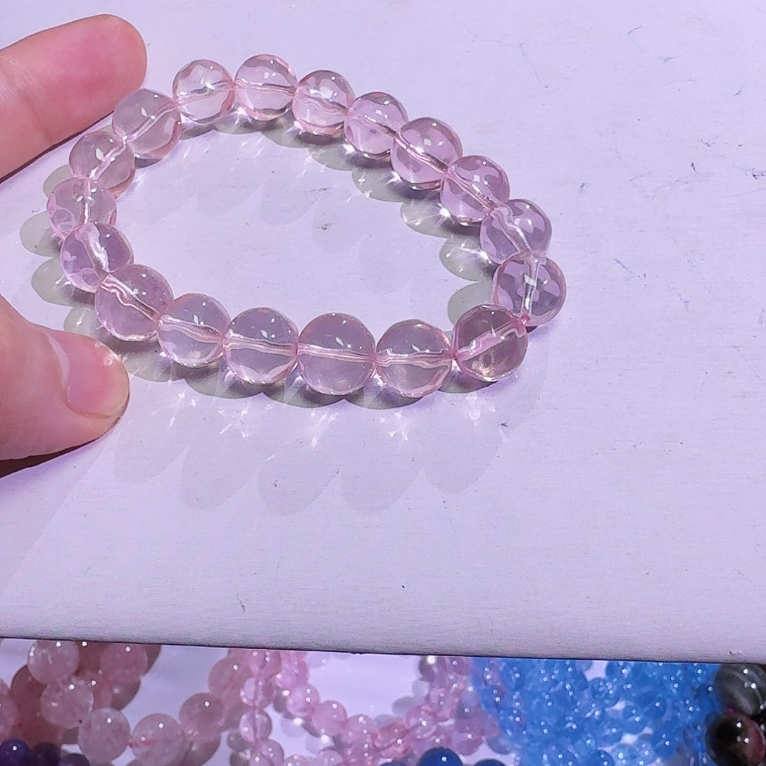 水晶手链未镶嵌低****子冰橘粉11mm