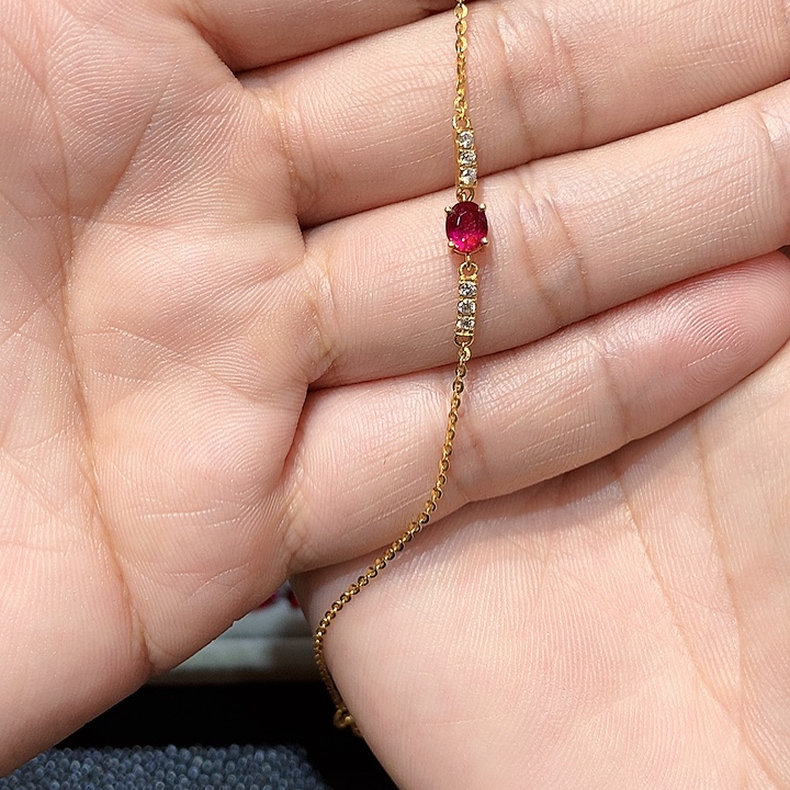 潇***康红宝石手链18K金镶嵌