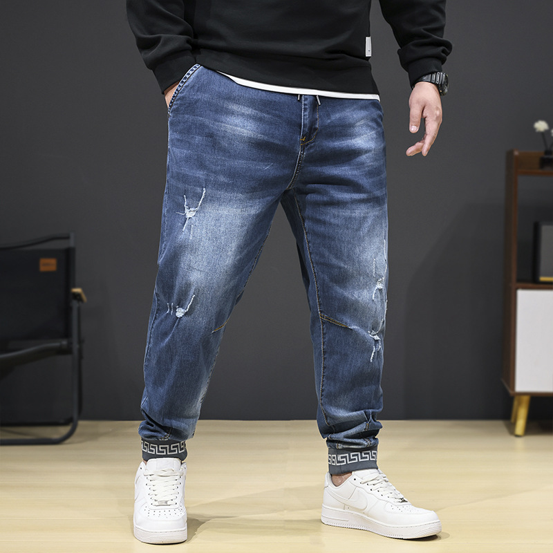 加肥加大码男秋季弹力小脚牛仔裤胖子宽松百搭长裤裤松紧腰潮流