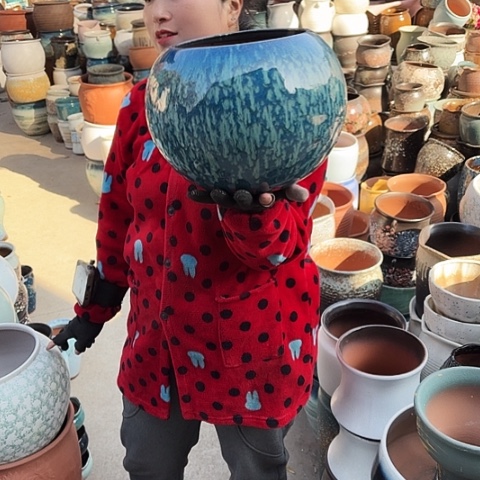 口19高22瑕疵盆子。 