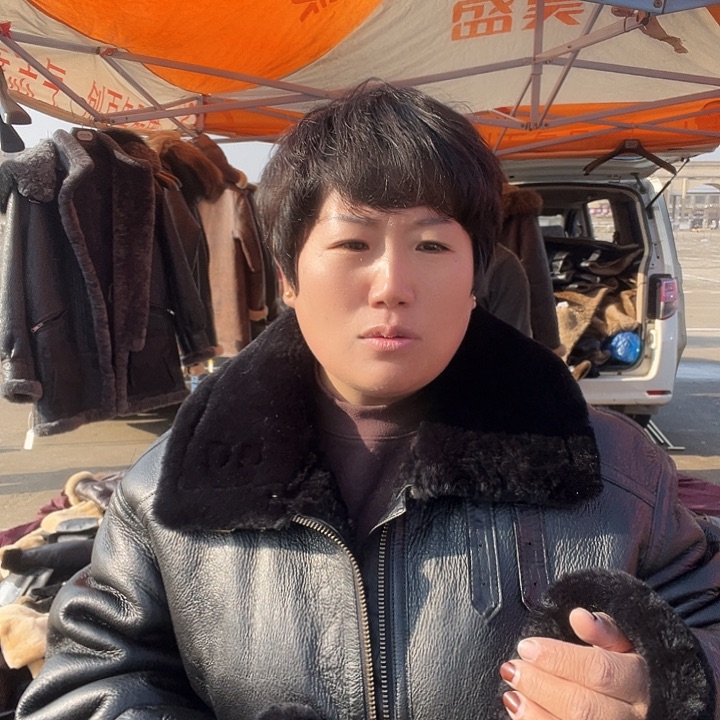 江****子黑色54皮毛一体男生穿