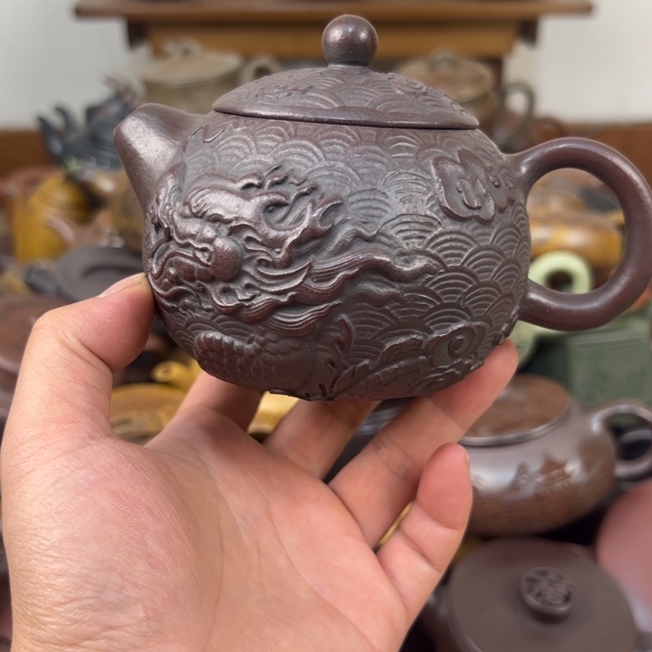 茶壶紫砂壶嘴毛边