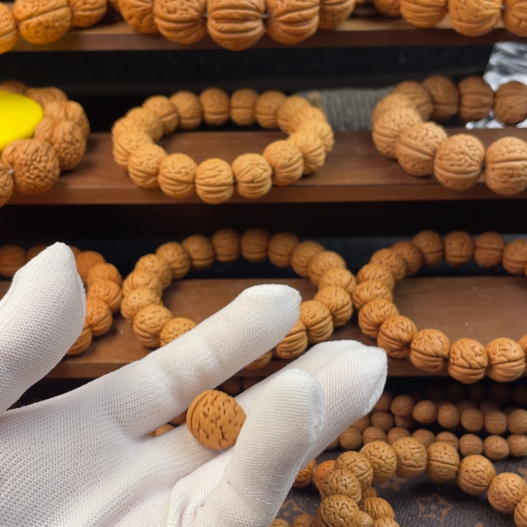 金***池吊坠桃核野生肌肉备子