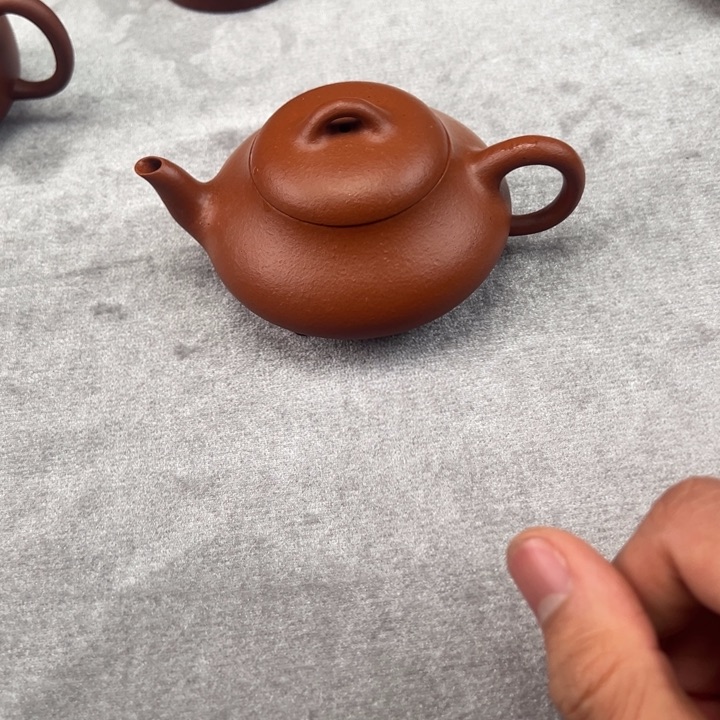紫砂茶壶微瑕缩盖朱泥汉棠石瓢