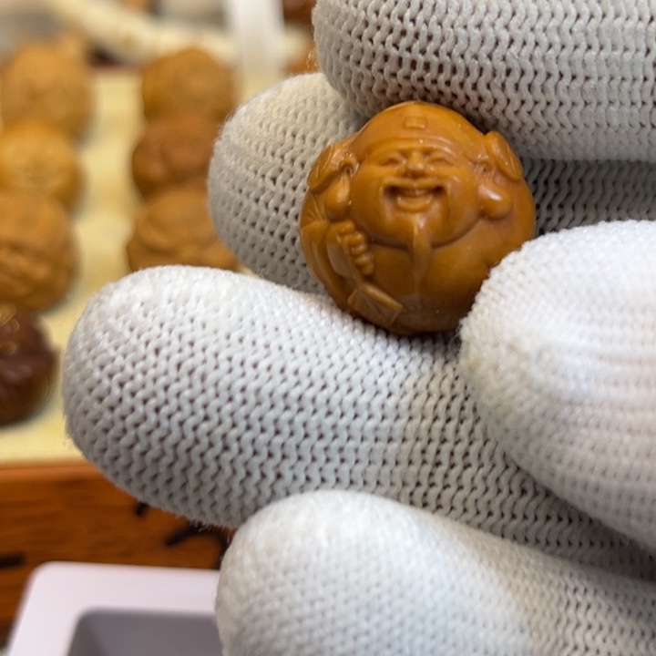 猴头核桃吊坠嗯。你说