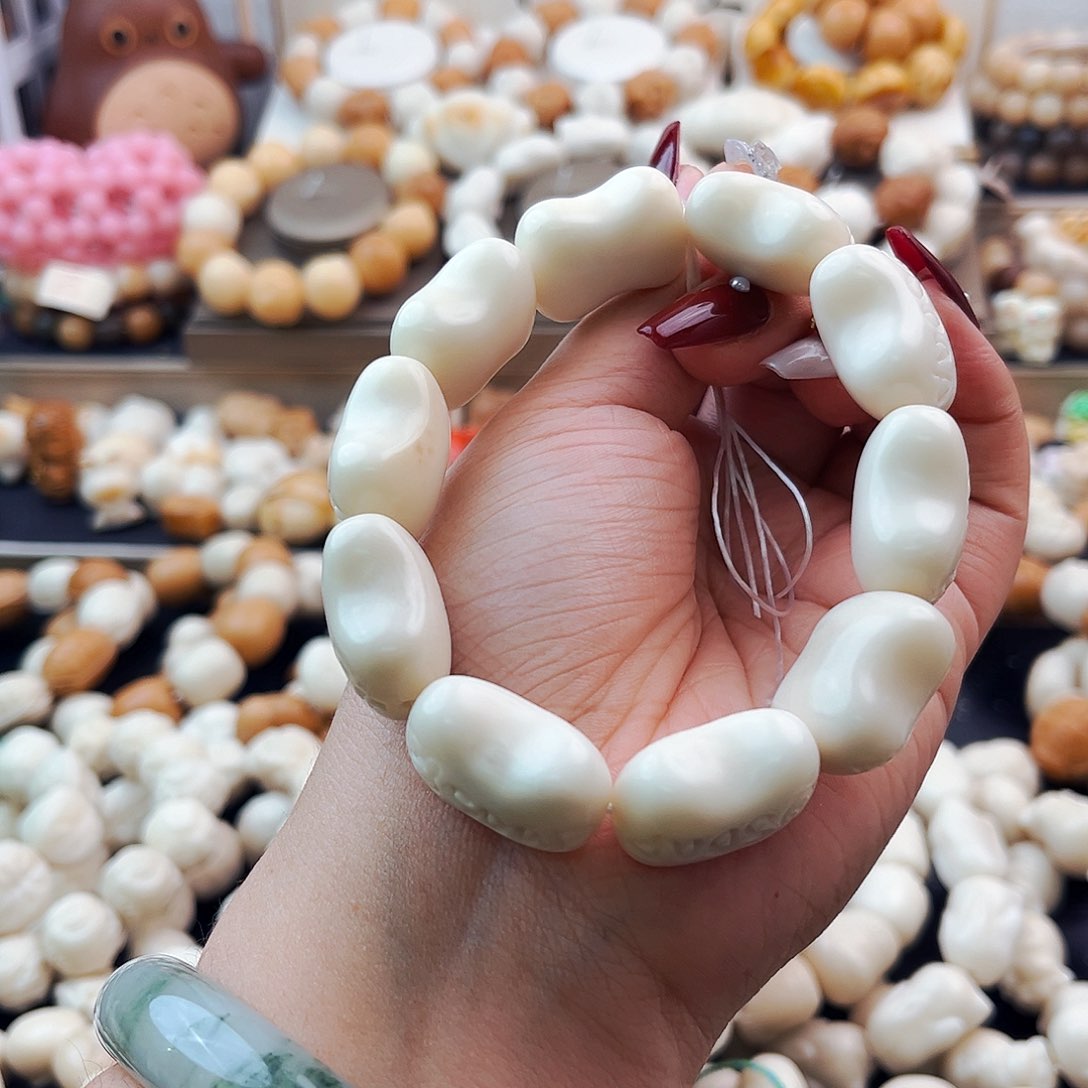 菩提根/象牙果手串奶***?元宵