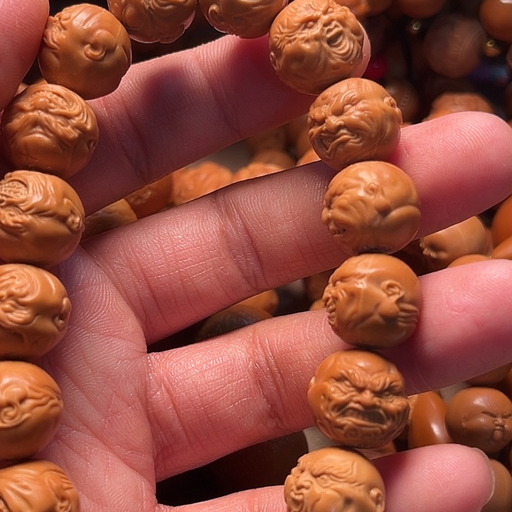 ·***·吊坠橄榄核恶人手串猴