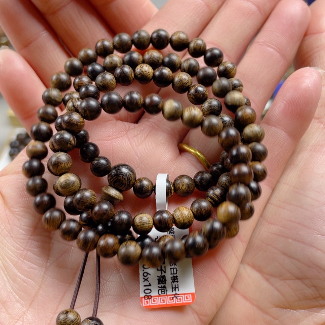 沉香手串越南芽庄老白棋玉化老料满瘤疤虎斑纹0.6×108