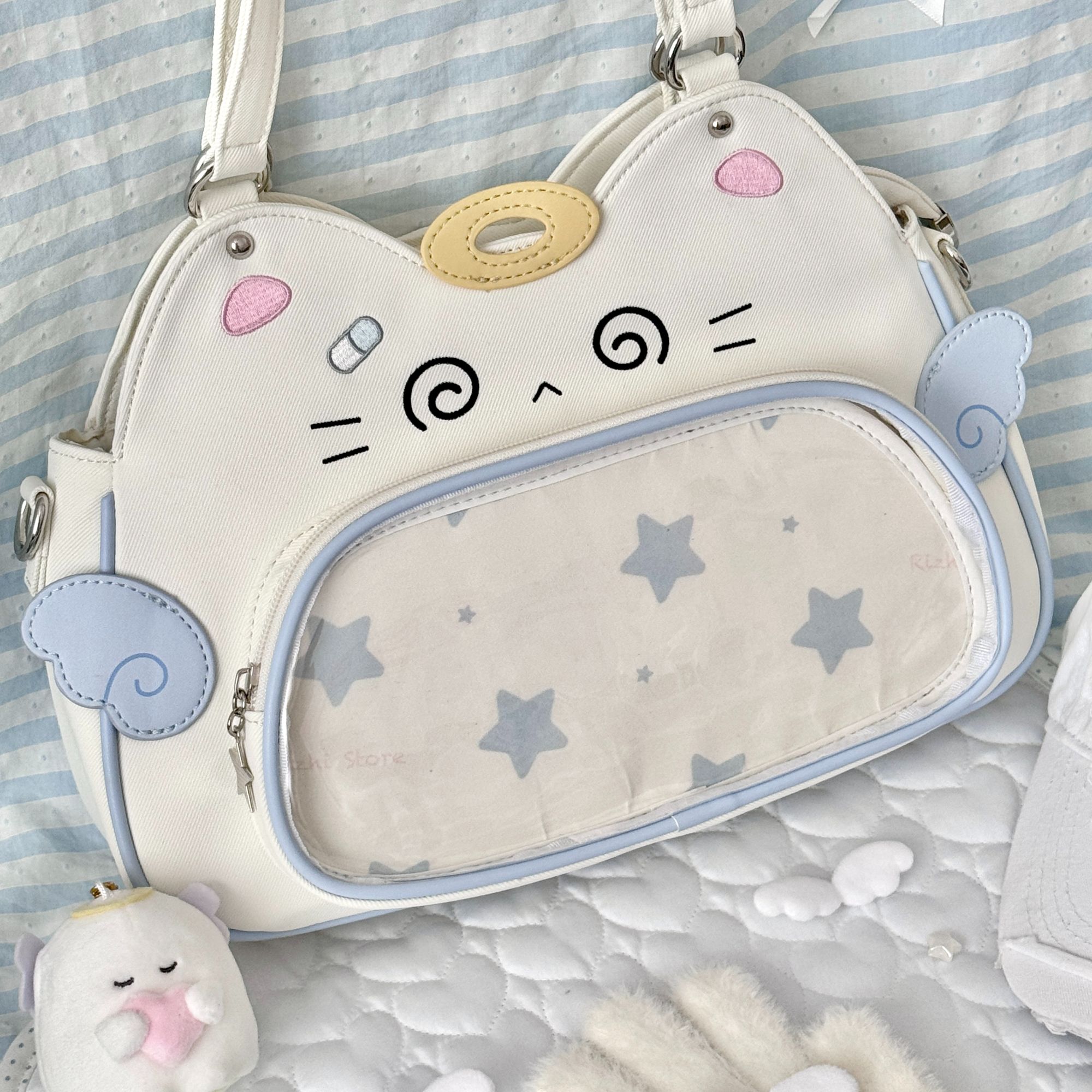 日稚商店猫咪痛包推荐娃包娃包尼龙斜挎包可爱包包追星学生小食量