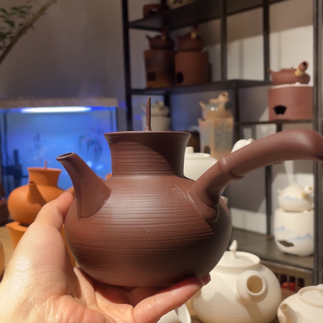 庆***余紫泥500ml宝瓶   