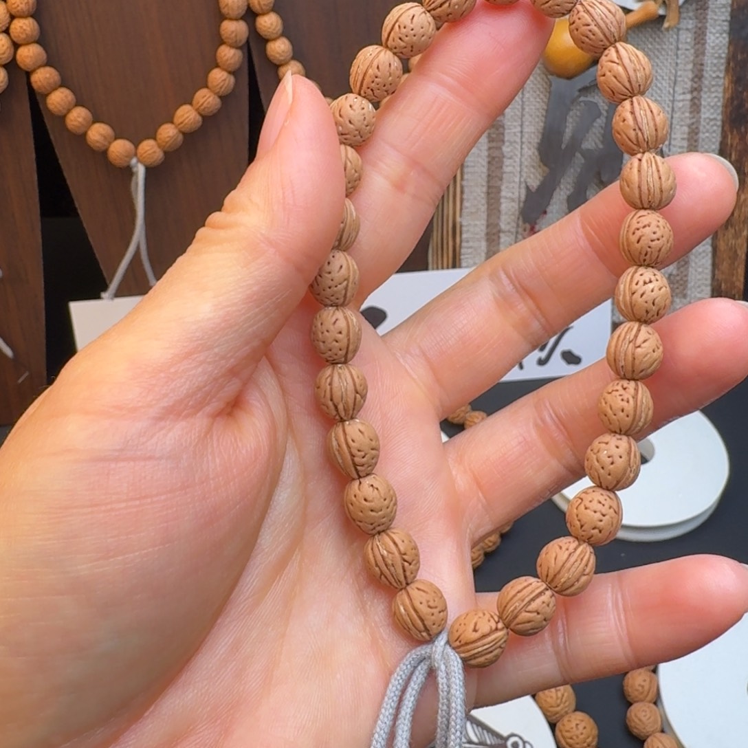 浪***鱼手串桃核8➕野生金瓜子手持