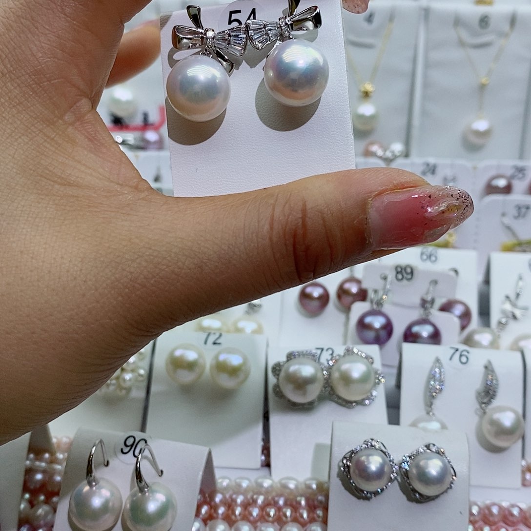 银S925镶嵌淡水珍珠耳饰蚊*