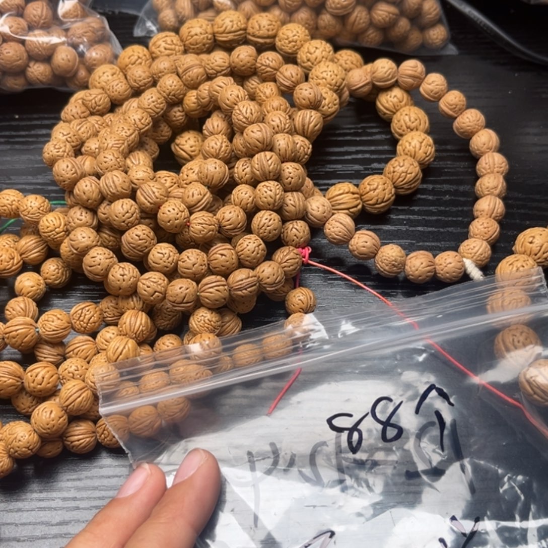 屠***关文玩核桃吊坠小桃核散籽批发