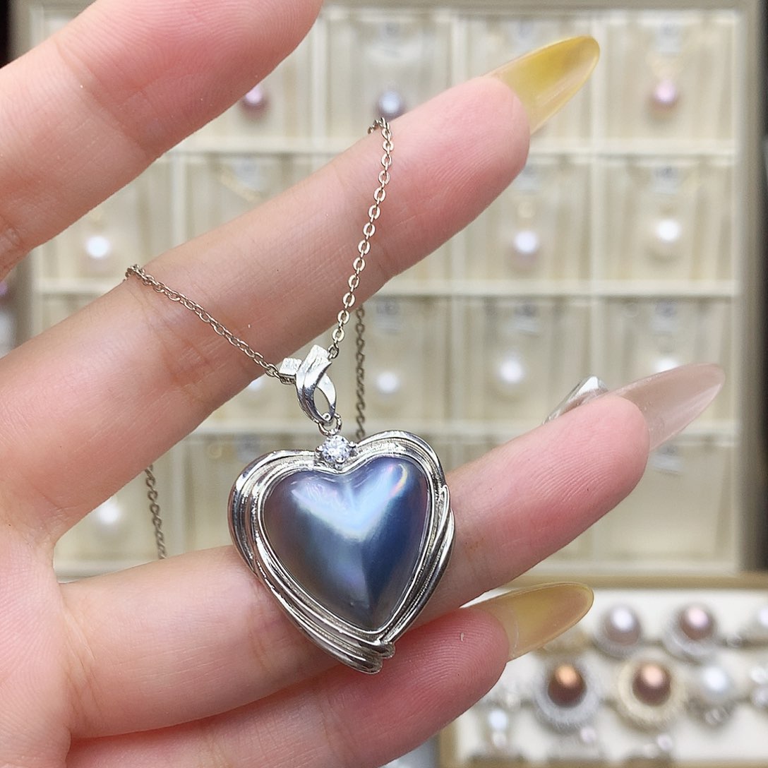 庞***四淡水珍珠银S925镶嵌吊坠(赠链)