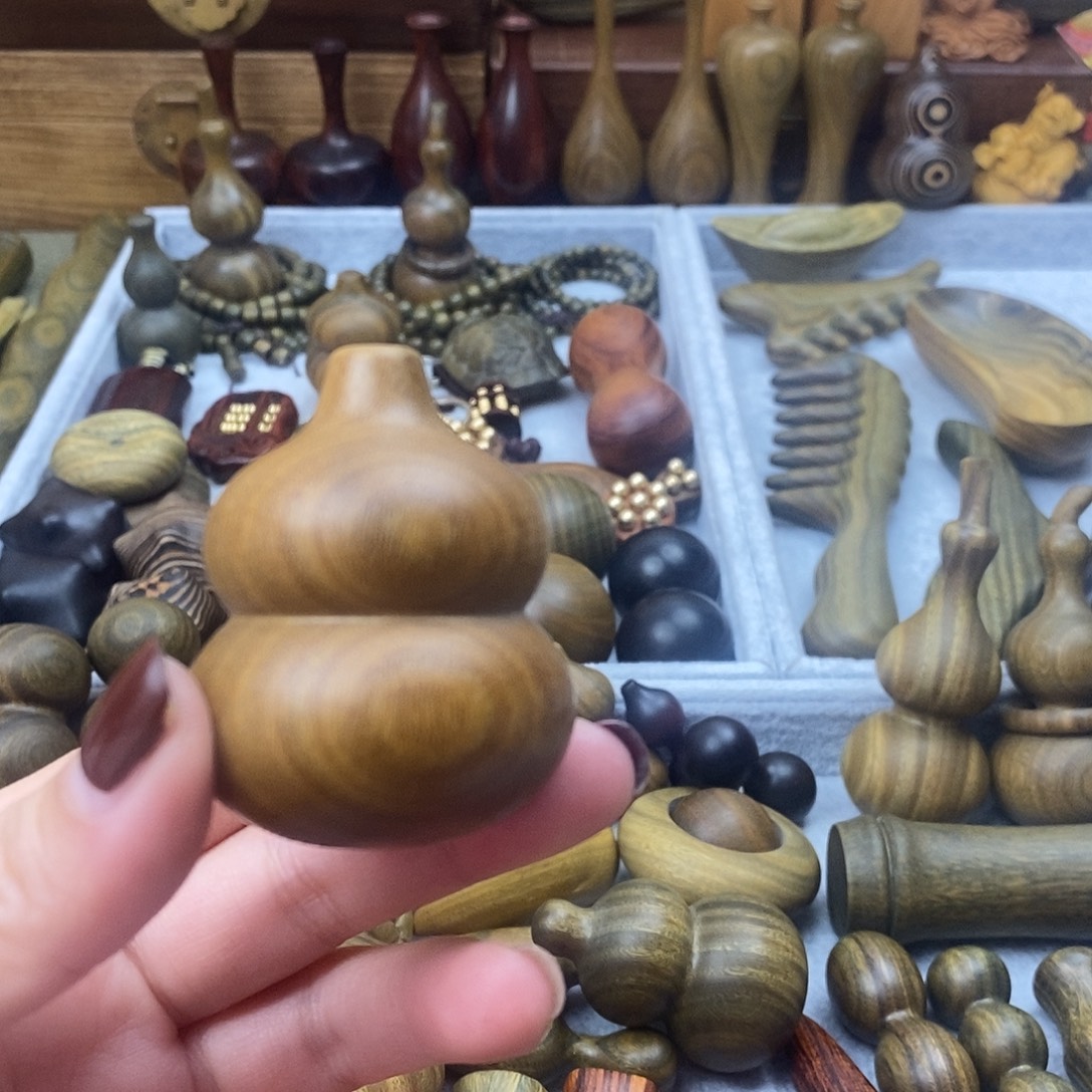 学***站香榧木阿根廷绿檀手把件