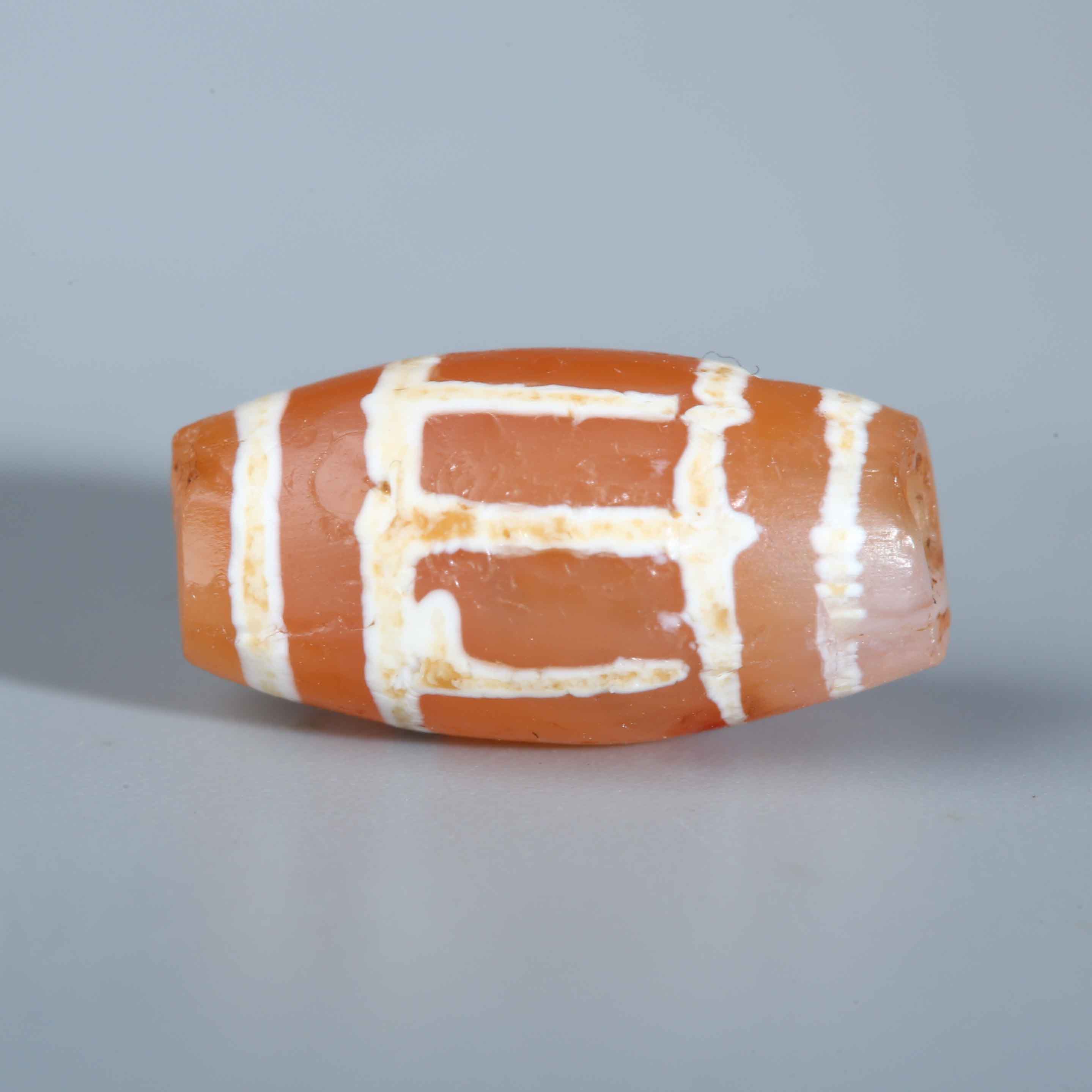 H13-396 东南亚pyu时期蚀花红玉髓管珠 7.2*14.2mm