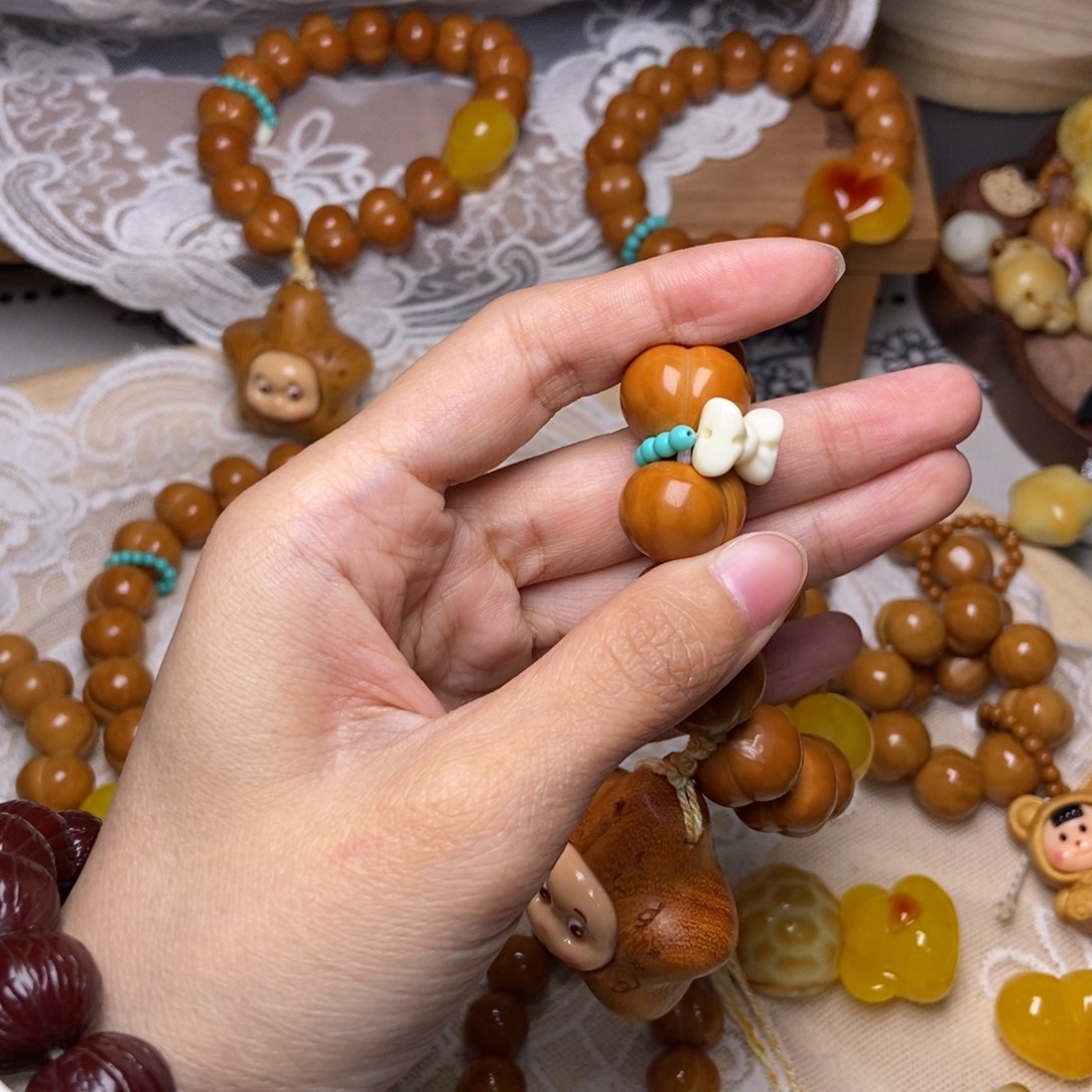 奔***筒猴头核桃吊坠跑环加蝴蝶结