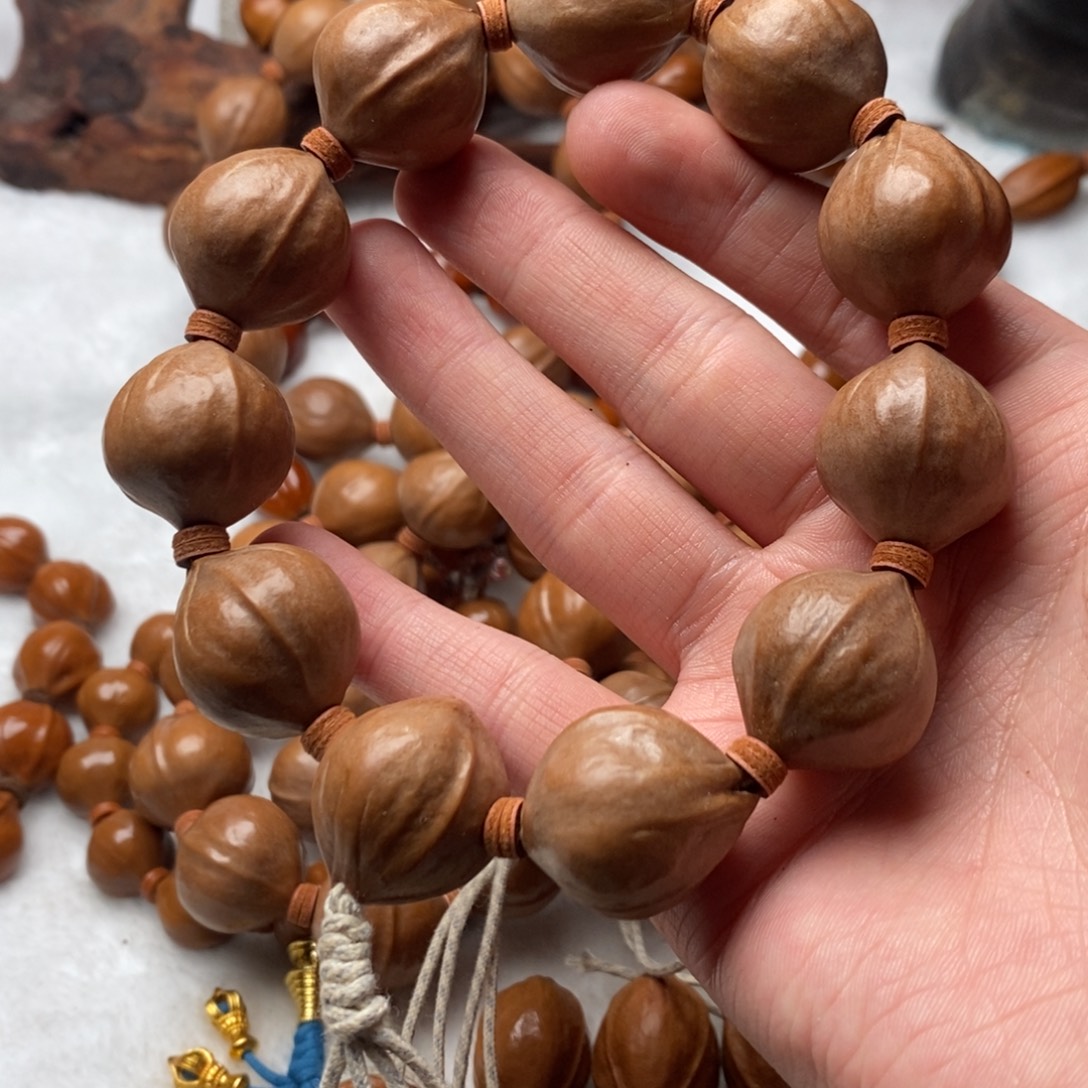 樱***塔橄榄核吊坠橄榄核