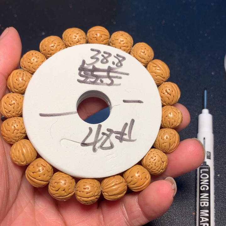 桃核手串48号健健康康了