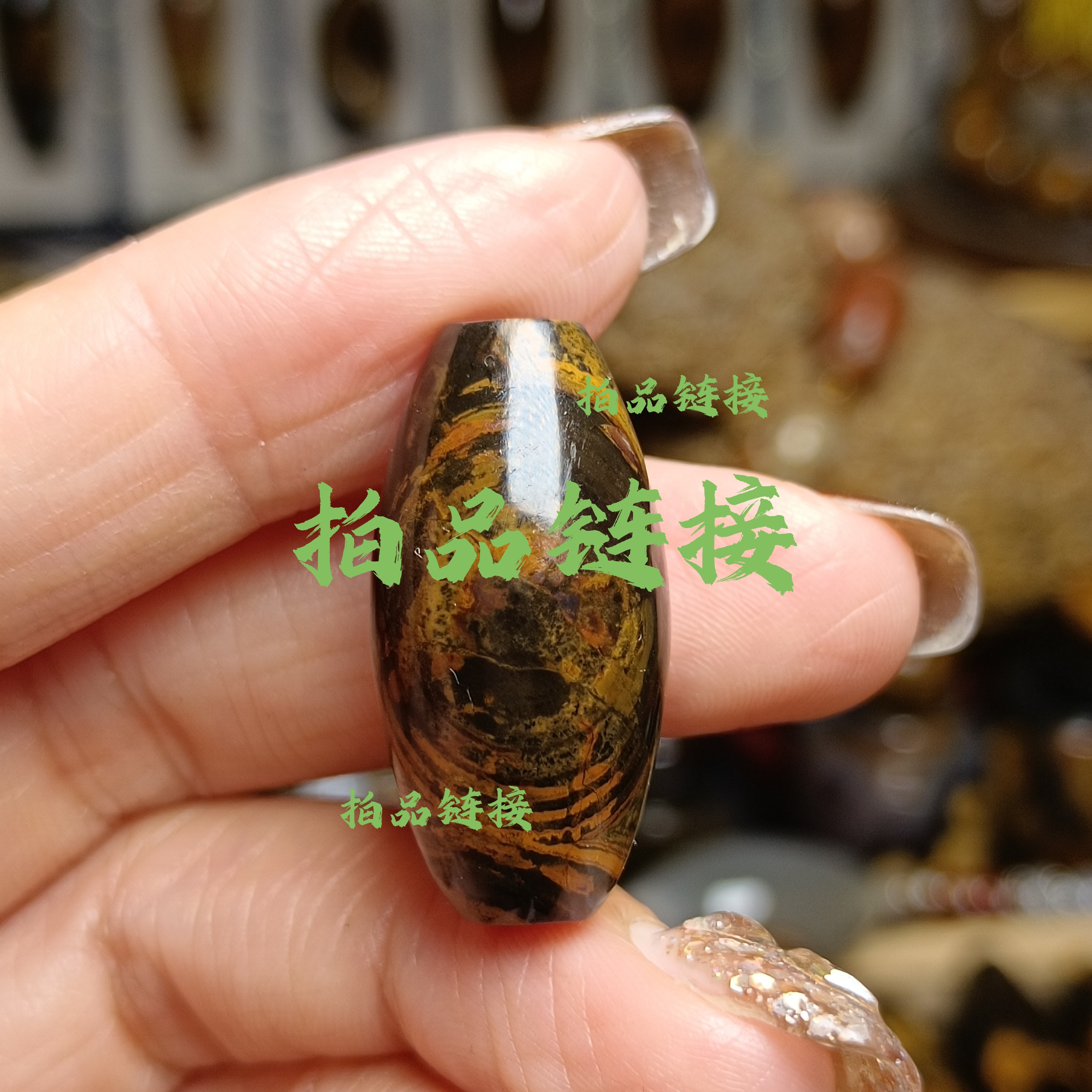 九眼石页岩蒙天珠拍品链接