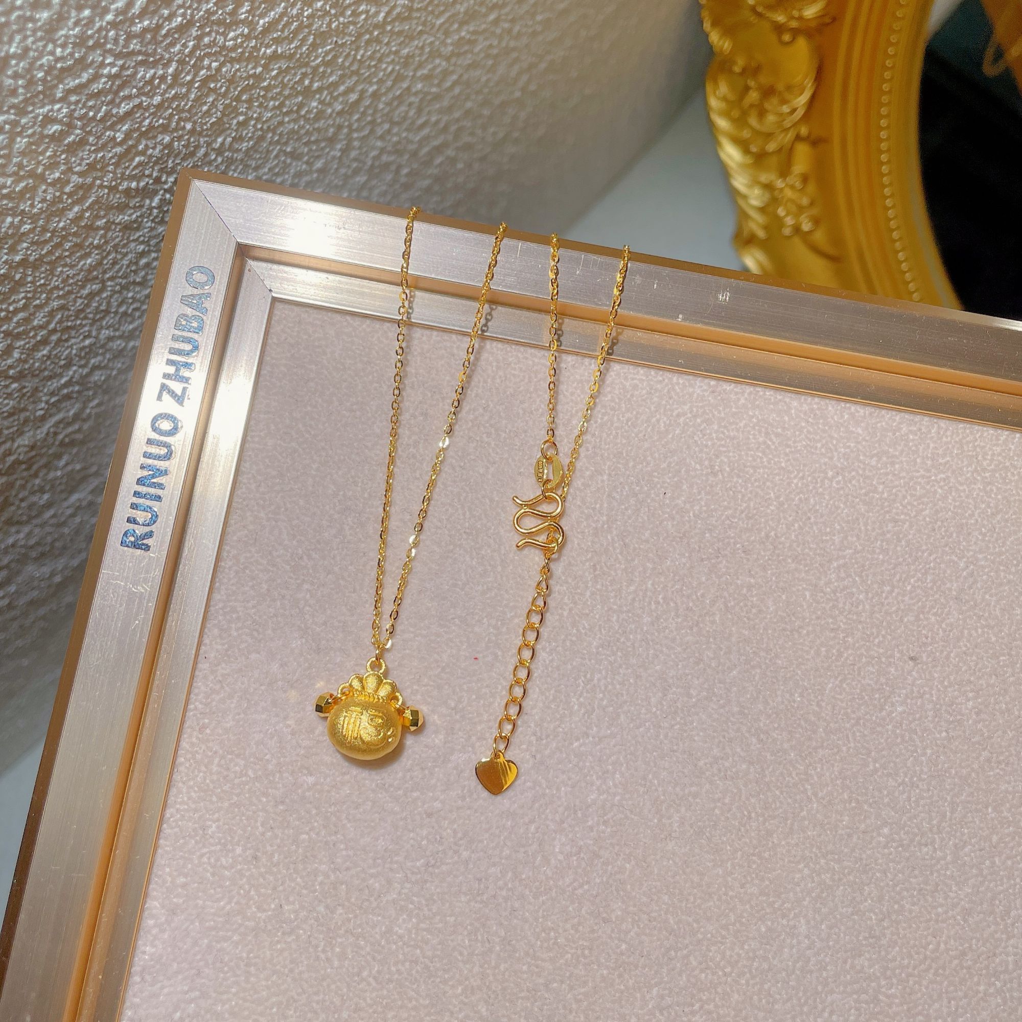 瑞诺黄金小福袋项链新款足金999钱袋子吊坠锁骨链生日礼物送女友