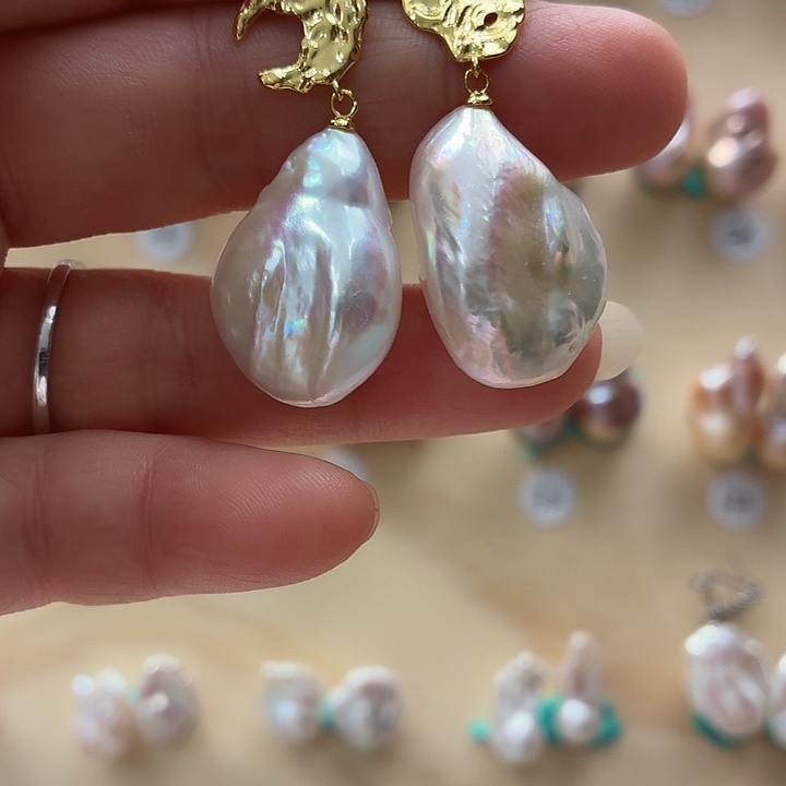 茜***举淡水珍珠耳饰银S925镶嵌