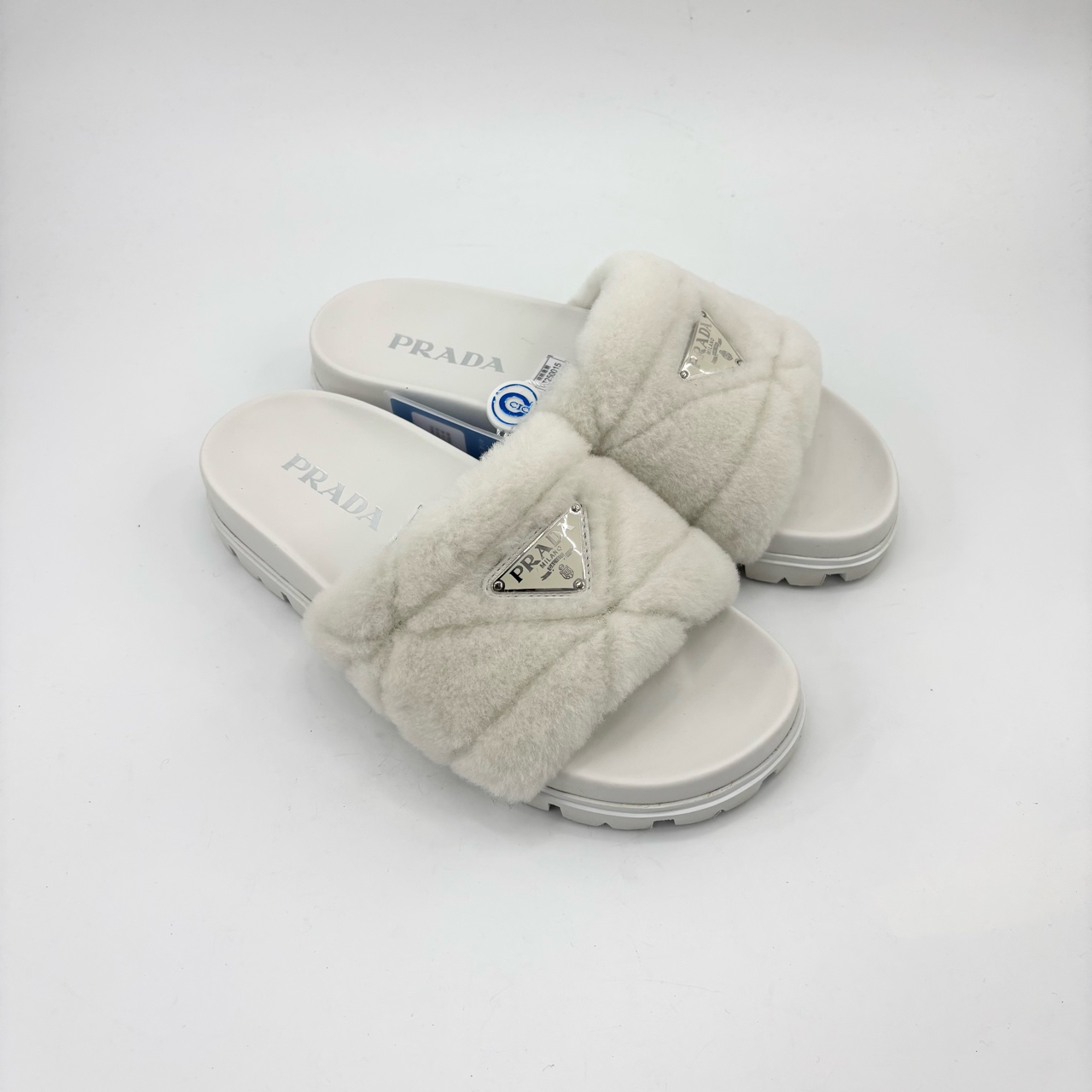 95新 Prada/普拉达 36.5码/女款白色时尚三角标毛拖/TT250015