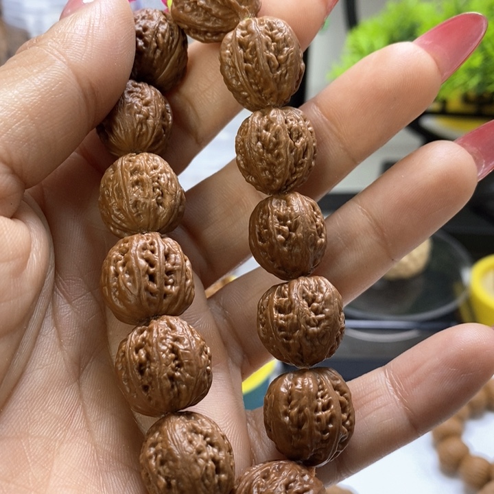 文玩核桃把件a**t手串