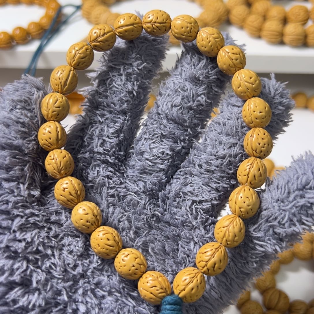 桃核手串水晶皮小钱袋桃核