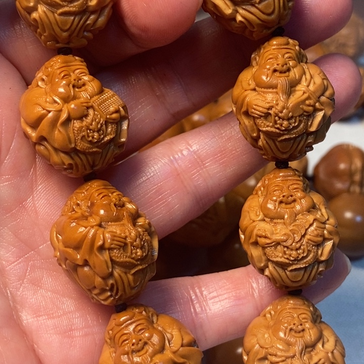 橄榄核手串/手链王***。龙财神微上色