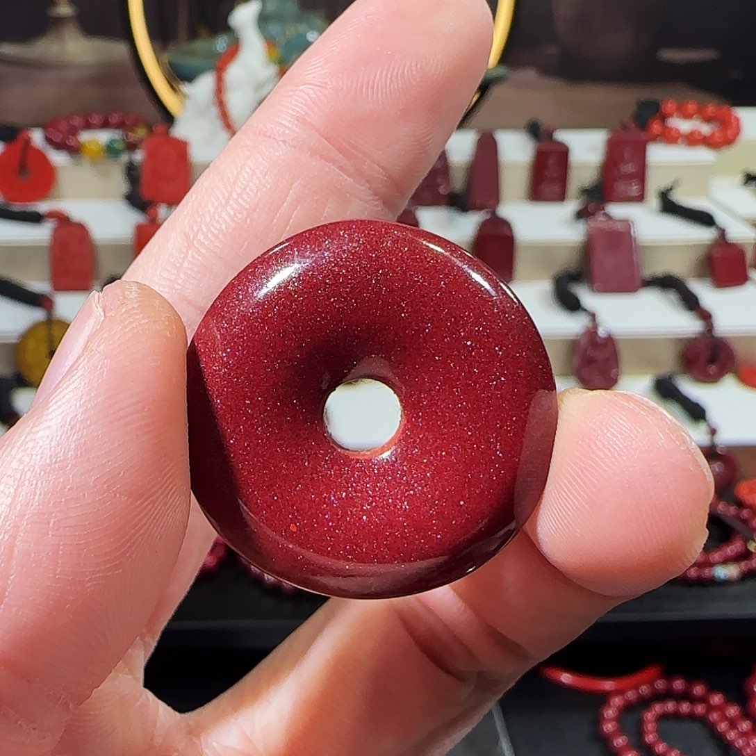 徐***板天然辰砂大孔红晶砂平安扣