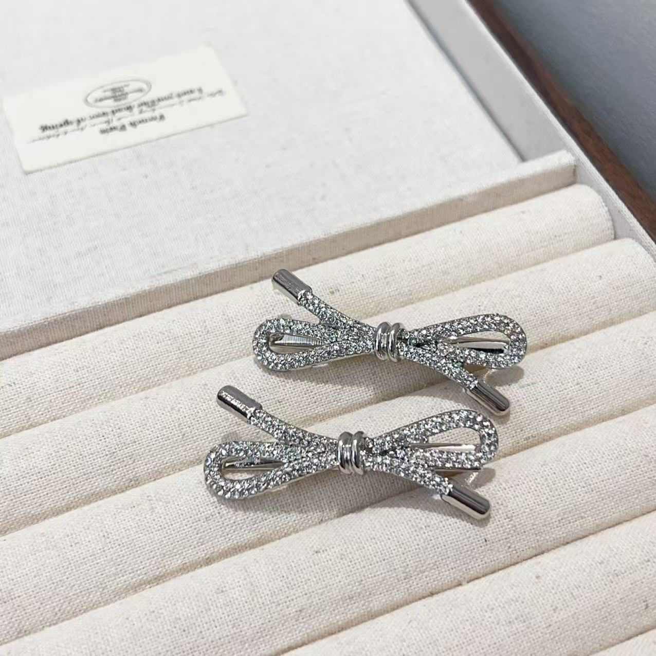 超闪立体蝴蝶结侧边刘海夹J1987