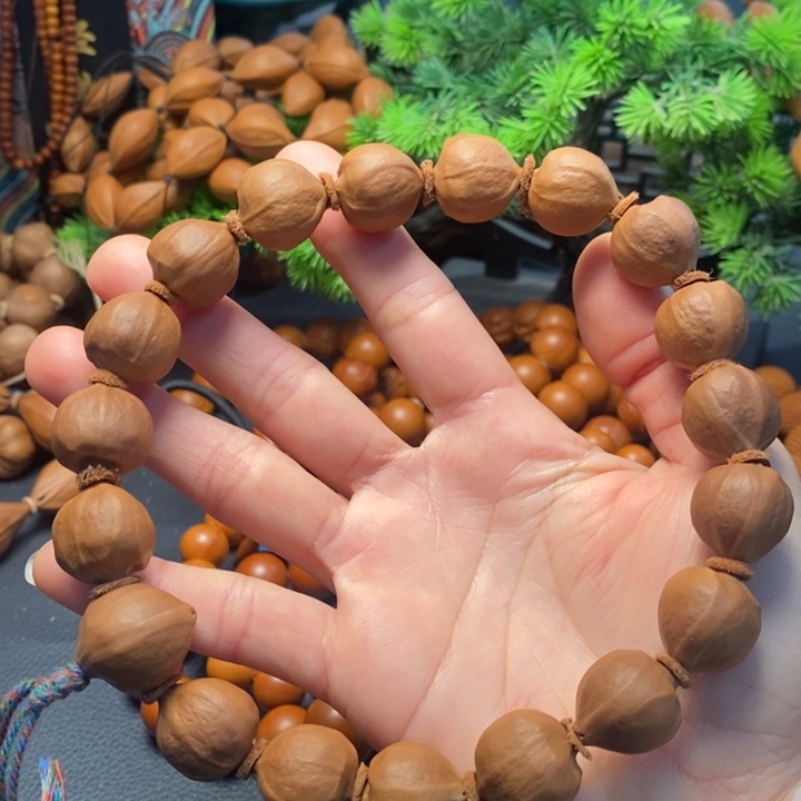 手串橄榄核1.7*1.9蜜桃臀