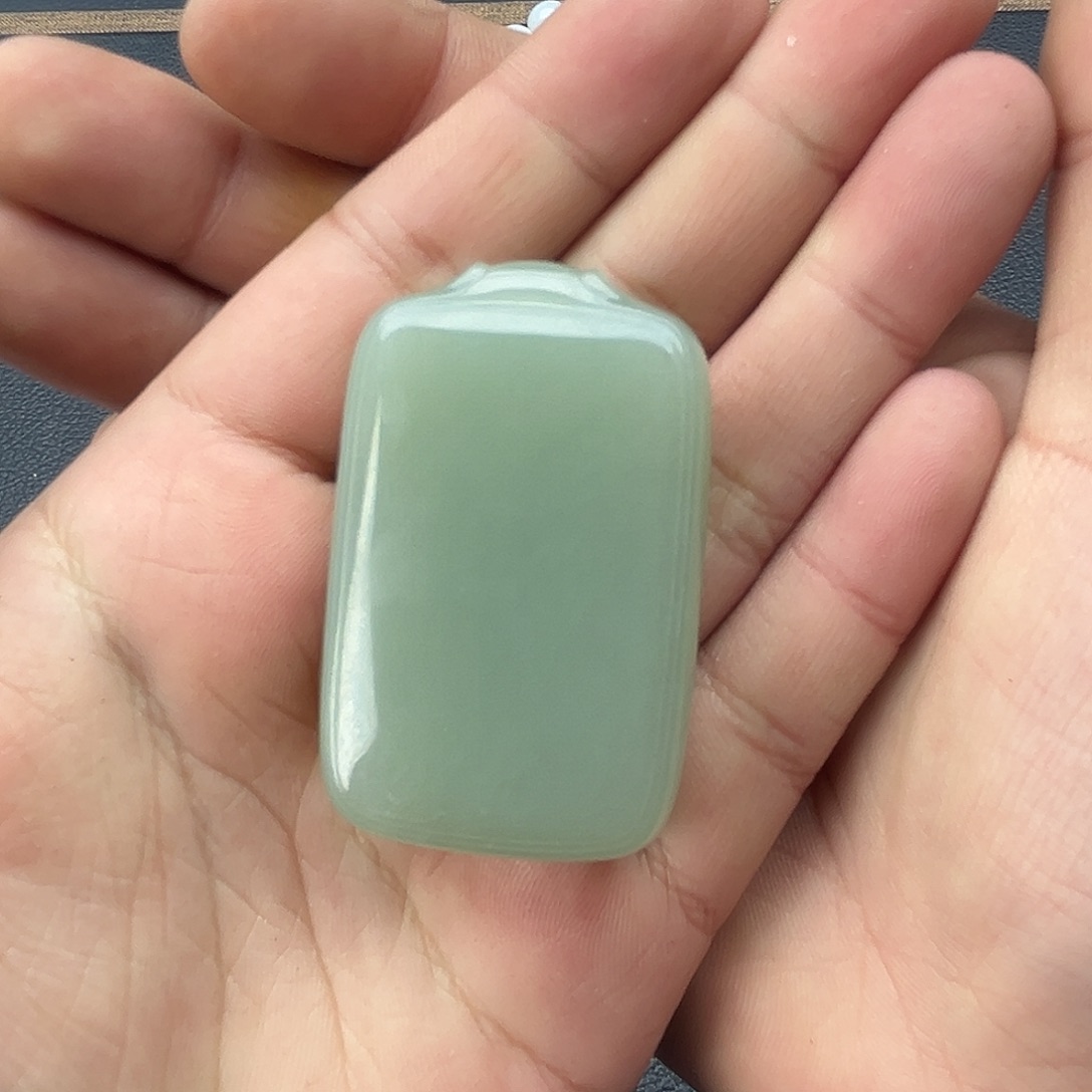 和田玉新疆且末钢板料无事牌未镶嵌橄**剑