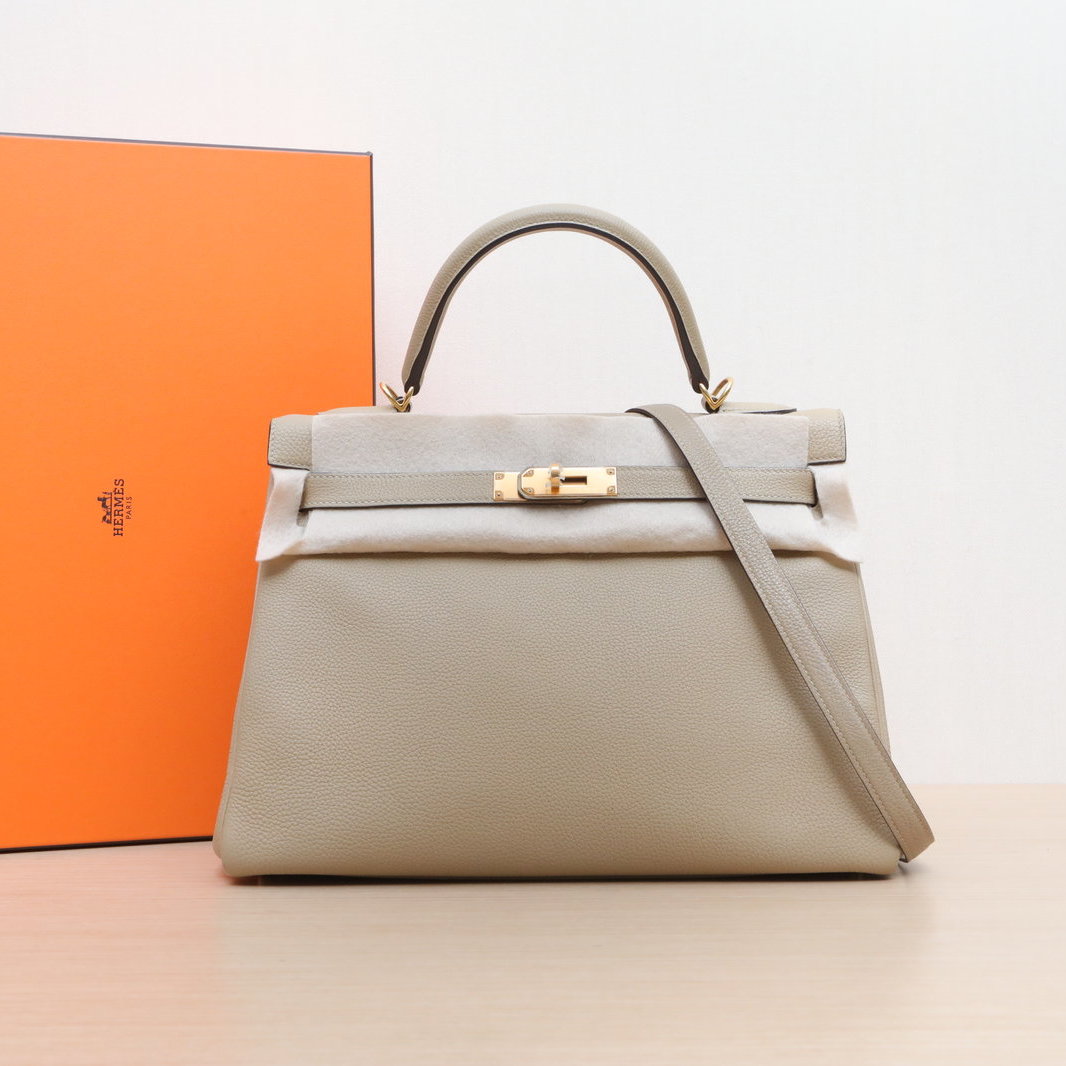 95新 Hermes/爱马仕 小花6珊 Kelly 32 风衣灰 Togo皮 X刻 金扣包