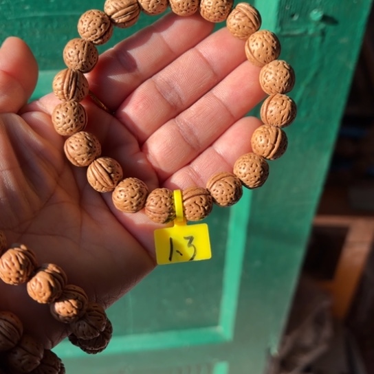 ①***缘木质野生桃核手串