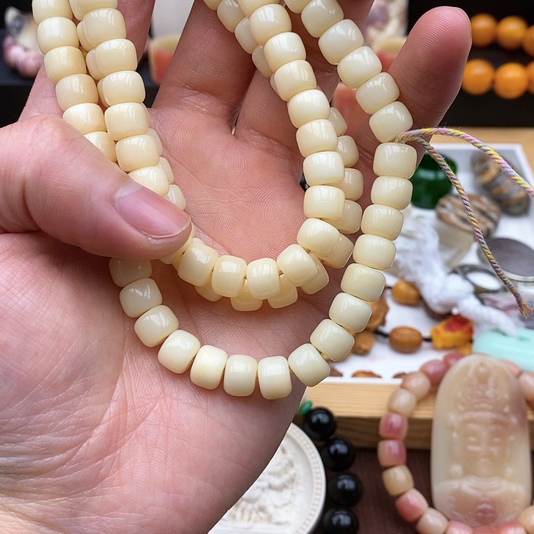 驼骨手串/手链9×7驼骨鸡油黄料