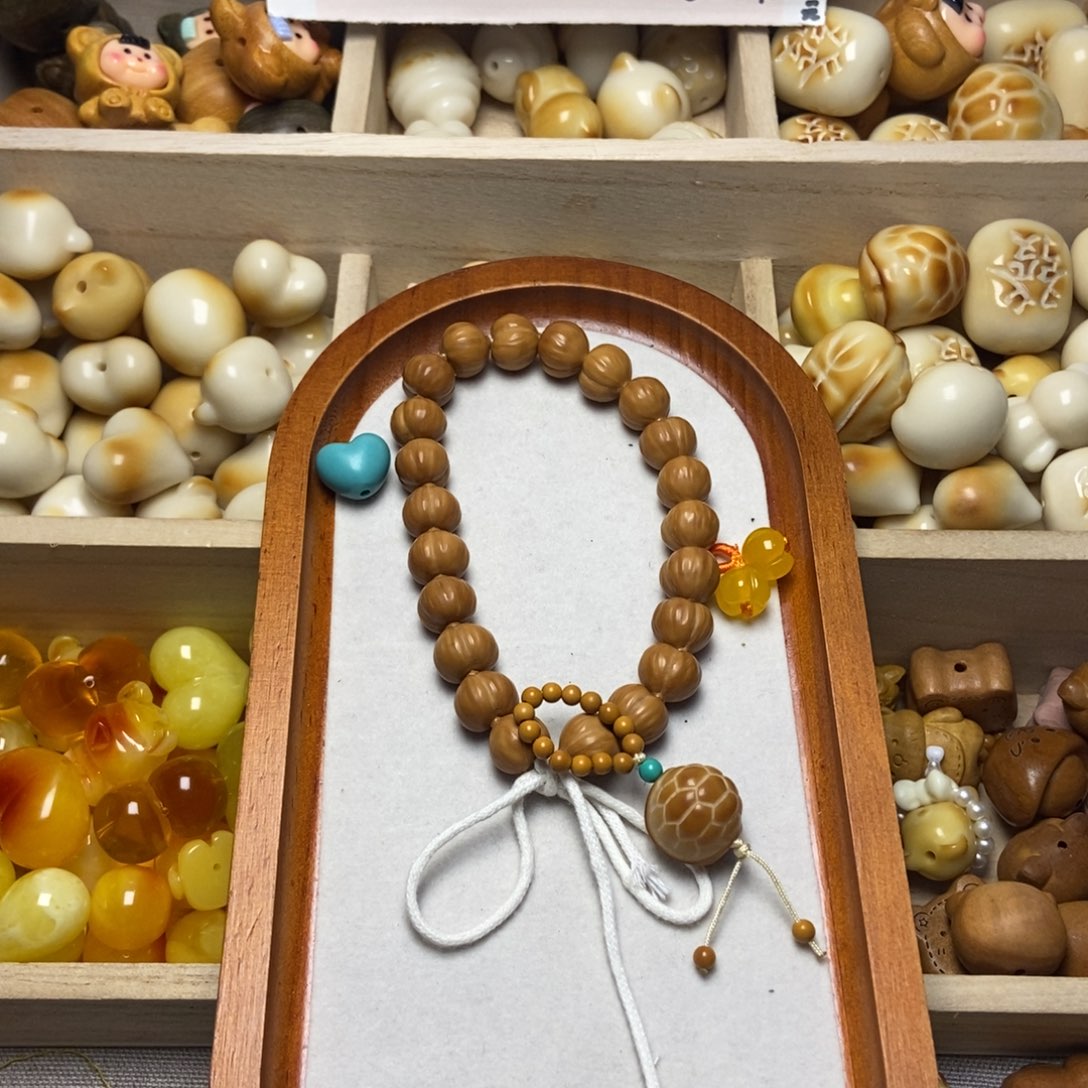 茉***馬吊坠猴头核桃小屁桃