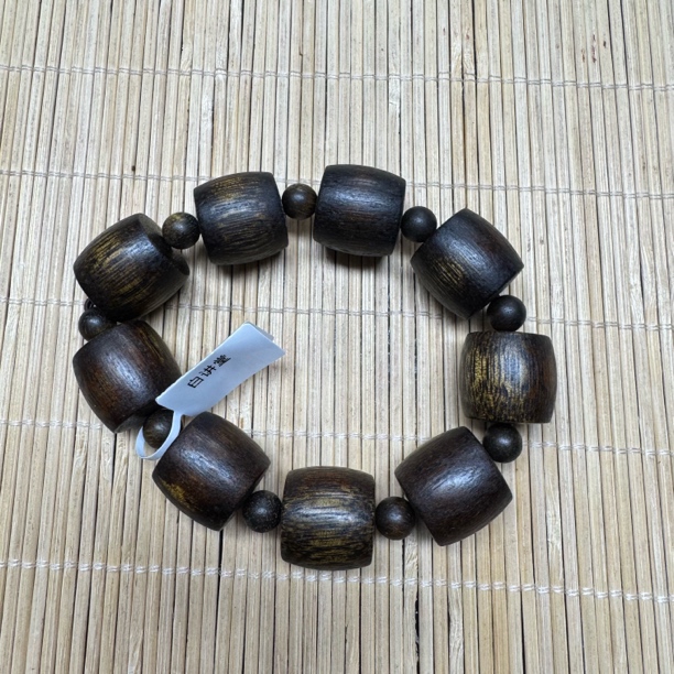 F507沉木桶珠手串